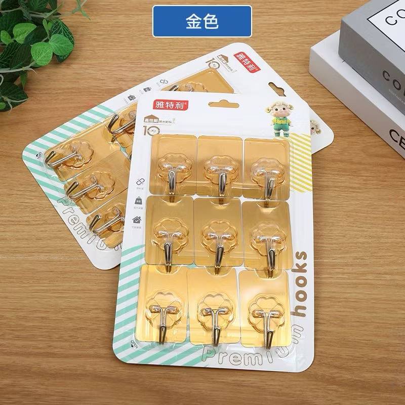 Vỉ 9 móc dán tường tráng vàng tiện lợi